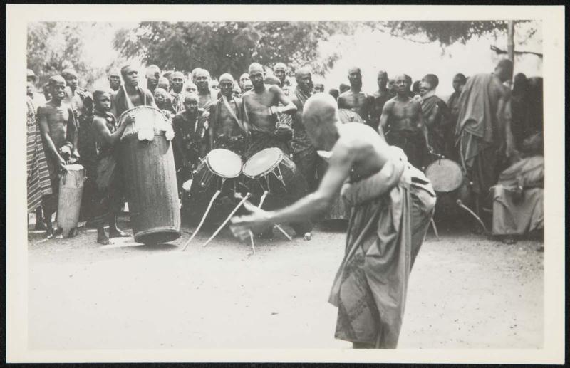 AFRICA - A festive dance-a time of making religious sacrifices and much palm wine drinking.