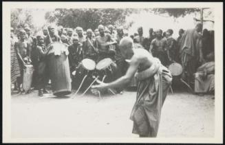 AFRICA - A festive dance-a time of making religious sacrifices and much palm wine drinking.