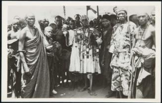 AFRICA - A petty chief in full regalia.