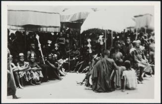AFRICA - Petty chiefs and their followers await the arrival of the important big chief.