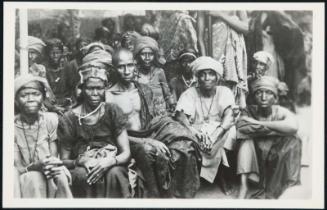 AFRICA - Dressed in their native best the villagers assemble to see the chiefs and enjoy the parade of royalty.