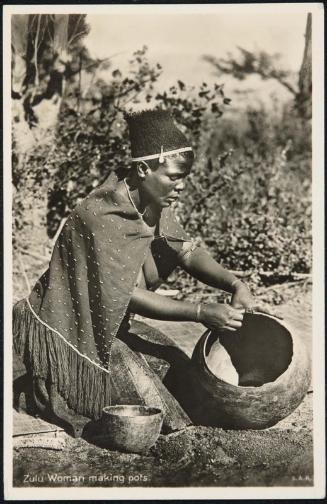 Zulu Woman making pots