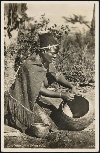 Zulu Woman making pots