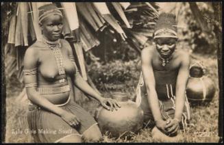 Zulu Girls Making Snuff.