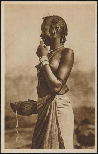 Young woman in profile, laughing