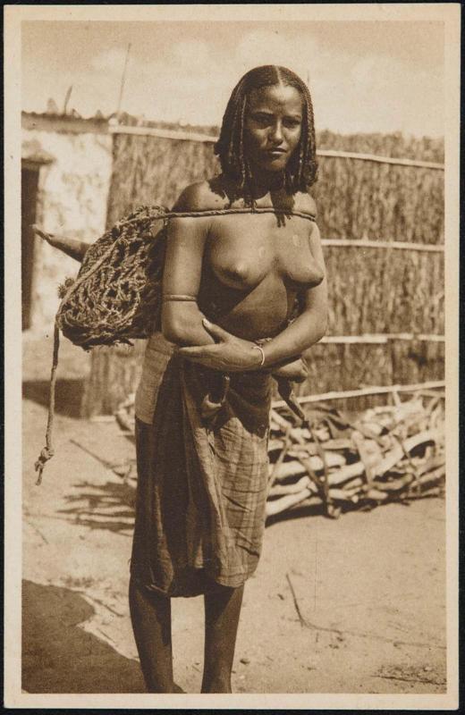 Young woman carrying a large bag