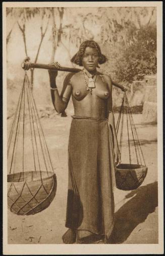 Young girl carrying water containers