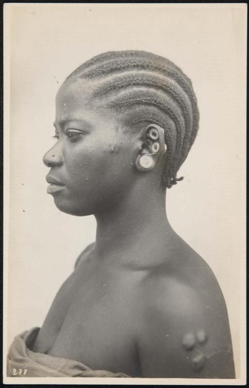 Bust portrait of a woman in profile.
