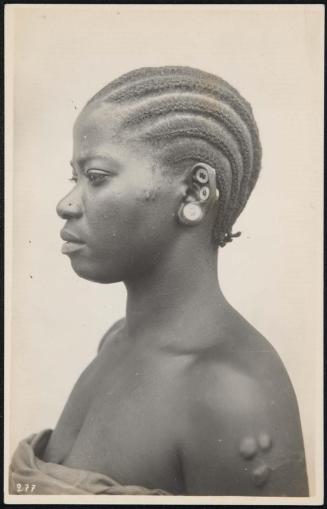 Bust portrait of a woman in profile.