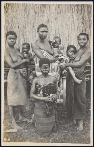 Four women with their babies