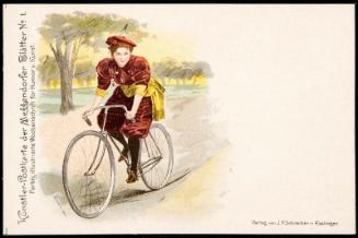 Woman in a red dress riding a bicycle