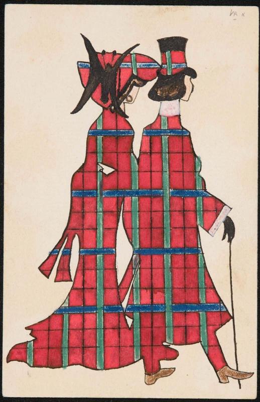 Couple in red-colored plaid attire