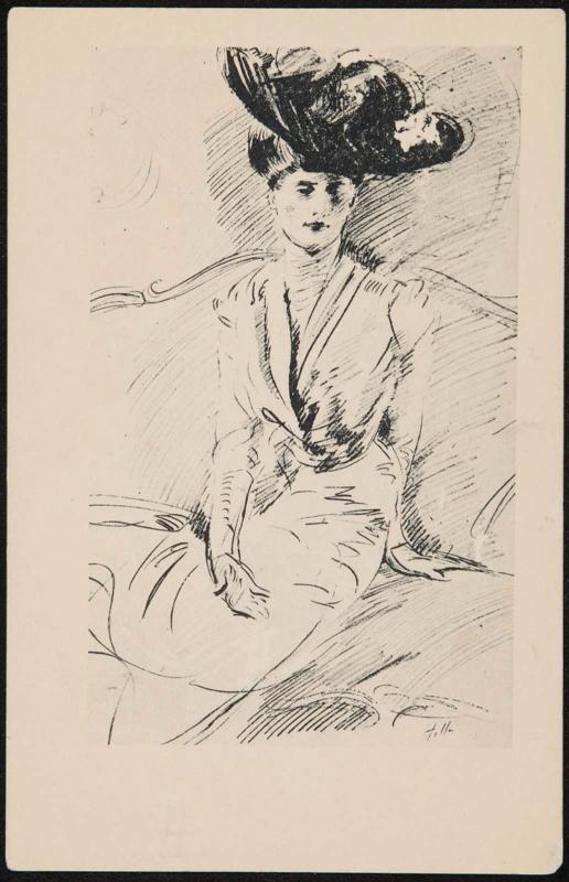 Woman sitting on a couch wearing a fancy hat