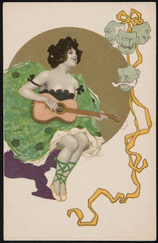 Woman in a green dress playing a guitar
