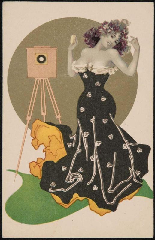 Woman in a black dress getting ready for the camera