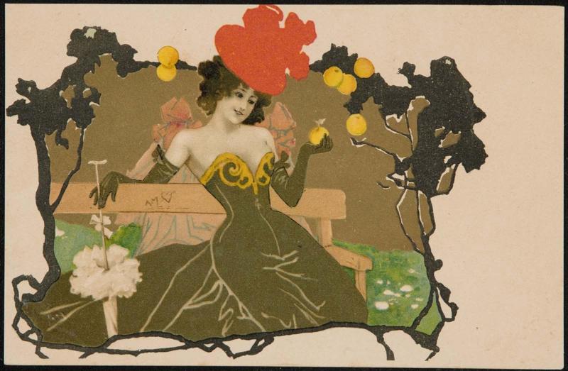 Woman picking fruit from a tree