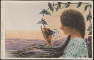 Woman smelling flowers