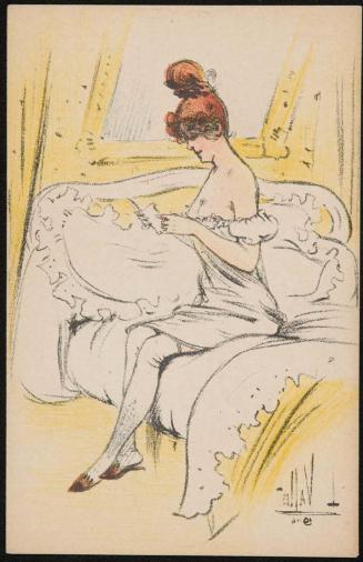 Woman reading a note in bed