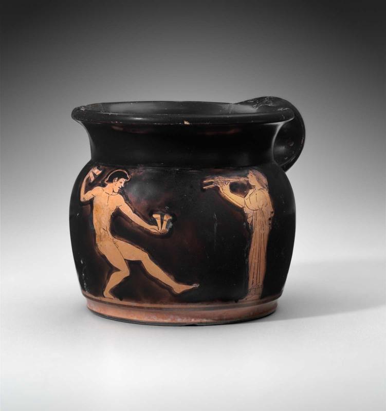 Mug (oinochoe) with youth dancing and girl playing pipes