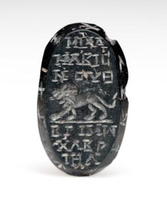 Magical gem with lion and inscription