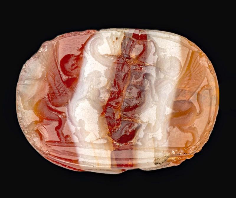 Scarab with two sphinxes at sacred tree