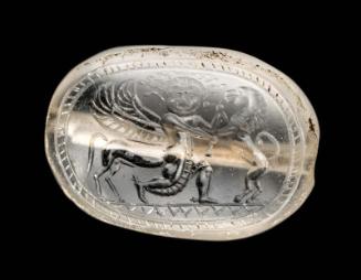 Scaraboid gem with gorgon as winged centaur seizing a lion