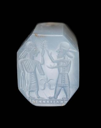 Pyramidal seal with standing man and woman