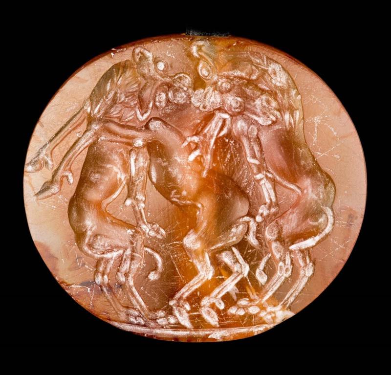 Lentoid seal with two lions attacking a stag