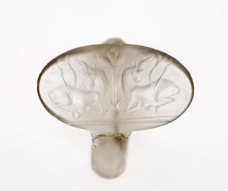 Ring and oval bezel with two bulls flanking a tree