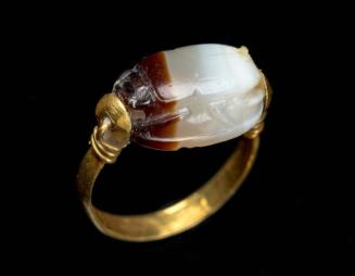 Scarab with warrior carrying wounded man