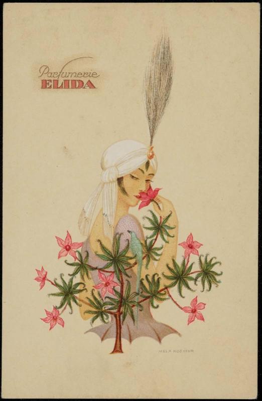 Woman smelling a flower on a bush