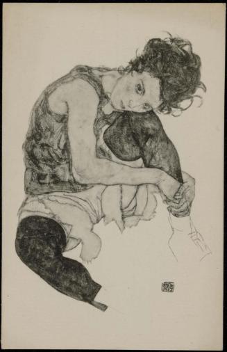 Woman in underclothes holding her knee