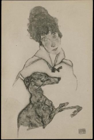 Woman holding a small dog