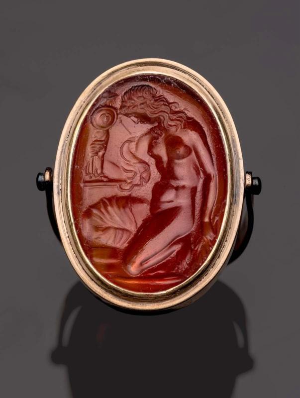Oval gem with Kassandra kneeling at Palladion