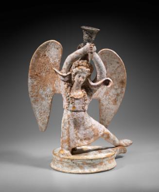 Oil flask (lekythos) in the form of a winged Persian dancer
