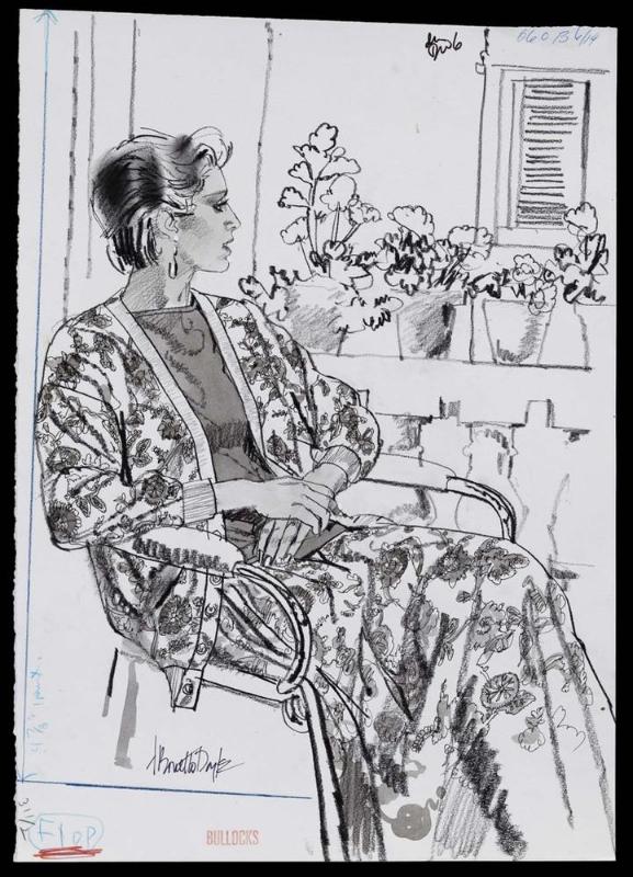 Model in floral-patterned suit seated indoors