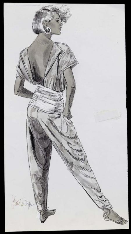 Model in backless jumpsuit