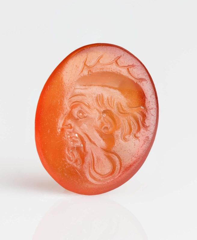 Oval gem with head of man as rooster