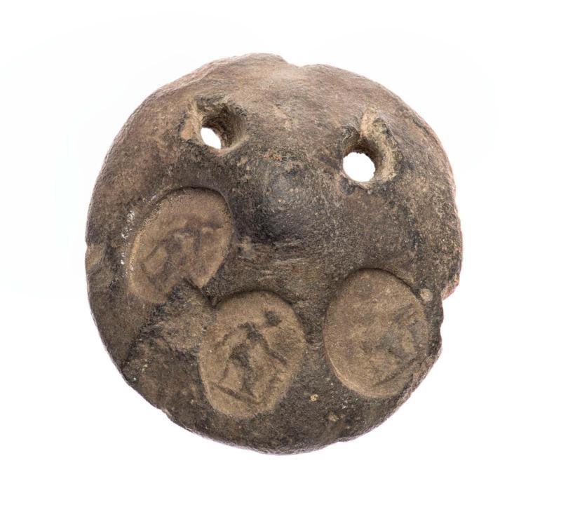 Loom weight with gem impressions