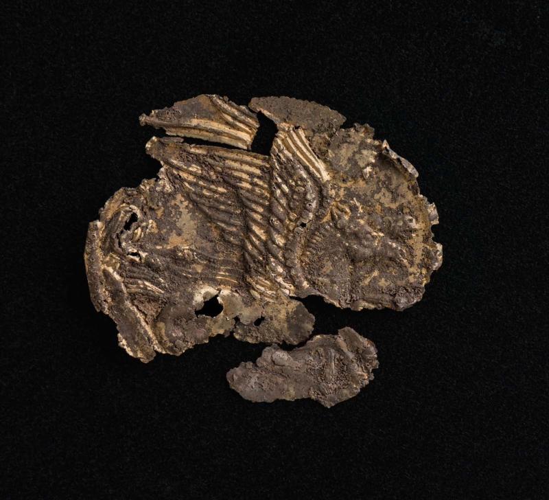 Small disk, fragmentary