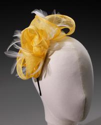 Yellow fascinator with feathers