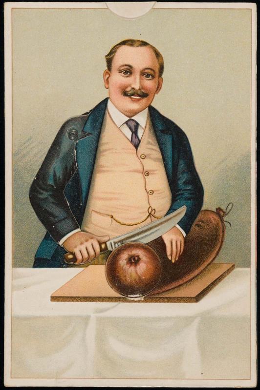 Man slicing a large sausage