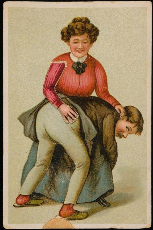Woman spanking a man