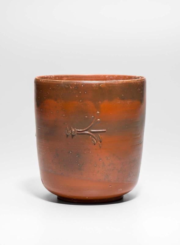Beaker decorated with foliage in trailed clay