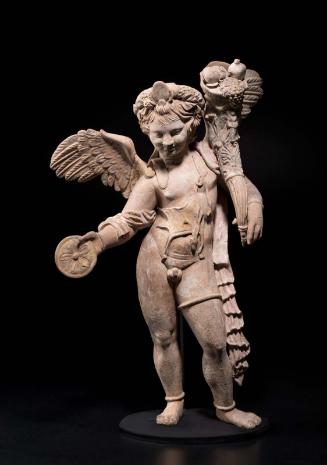 Statuette of Eros as Harpokrates carrying a cornucopia