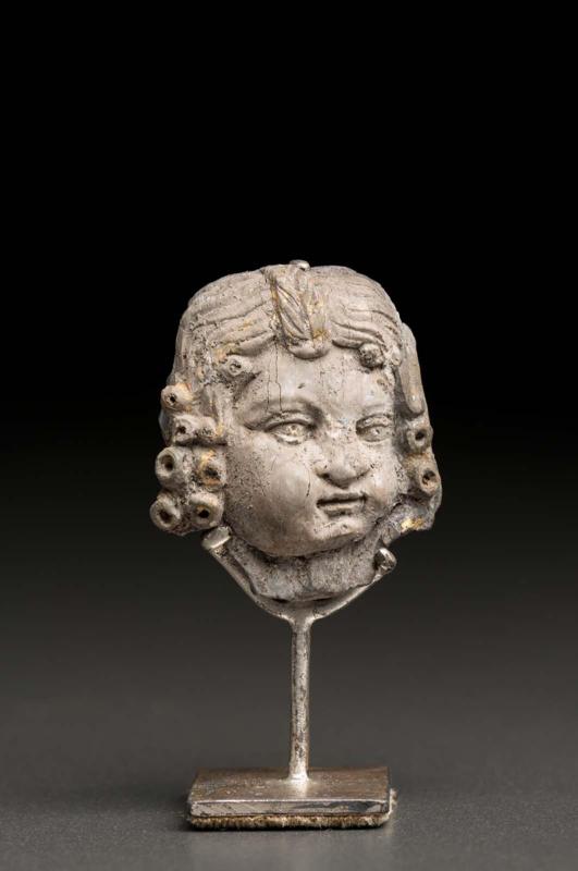 Relief with the head of a child