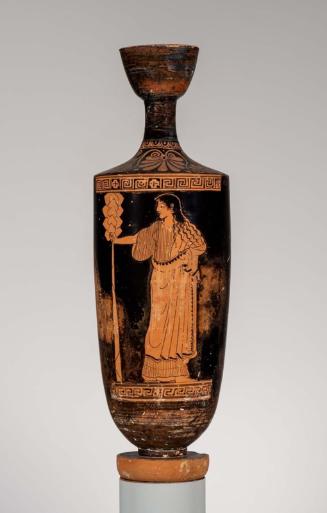 Oil flask (lekythos) with maenad holding a thyrsos