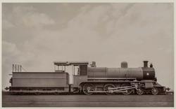 Locomotive (in profile, clouds)