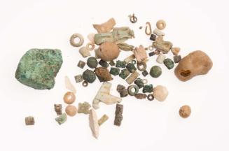 Beads, fragments of stone, and amulet