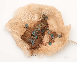 Fragment of beaded cloth